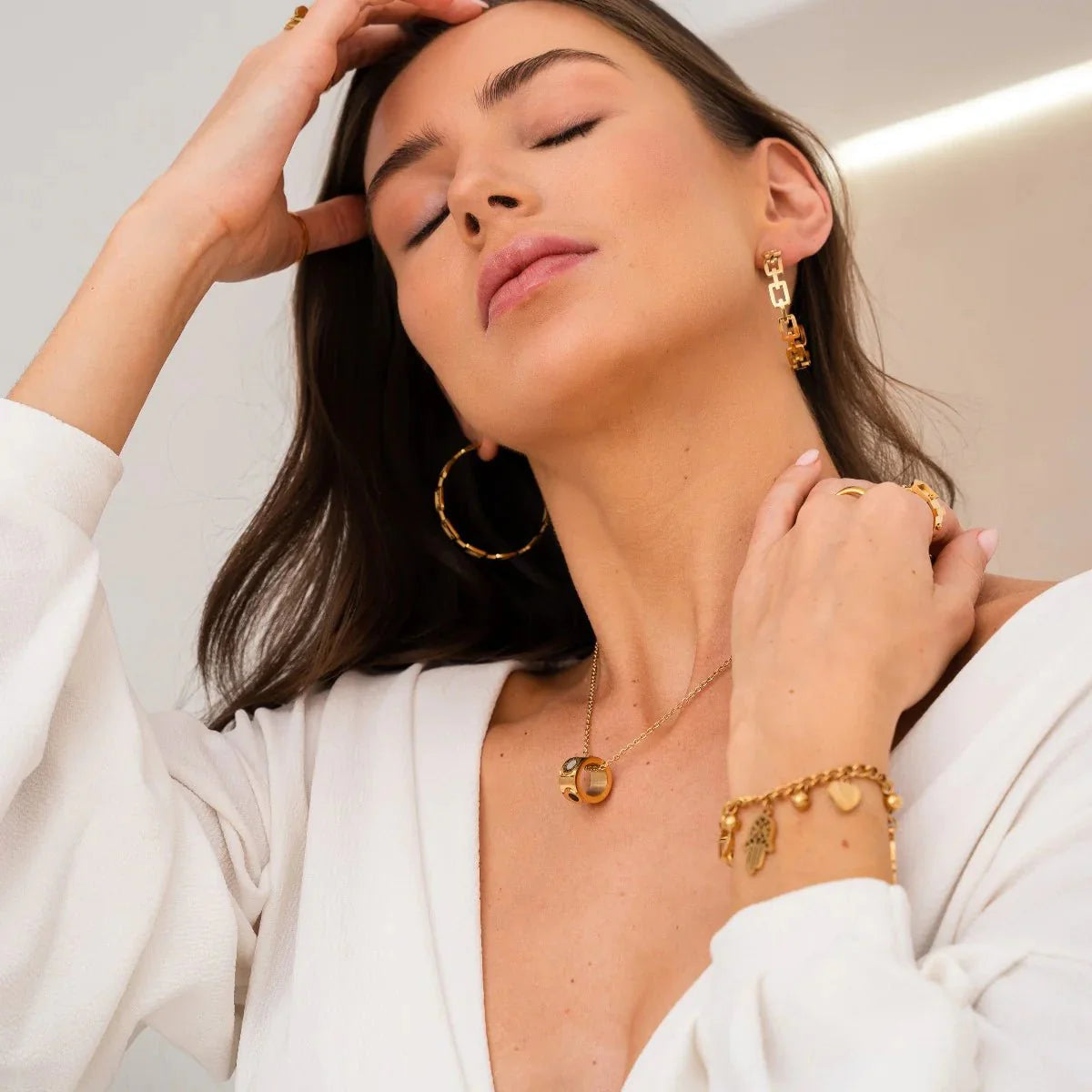 Rotating Roman Numeral Necklace Plated in 18K Gold