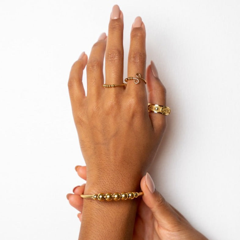 Adjustable Anti-Stress Bracelet with Gold-Plated Beads