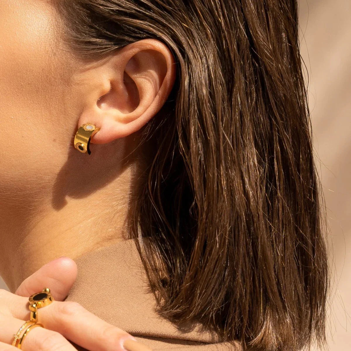 Rotating Earring Roman Numerals Plated in 18K Gold