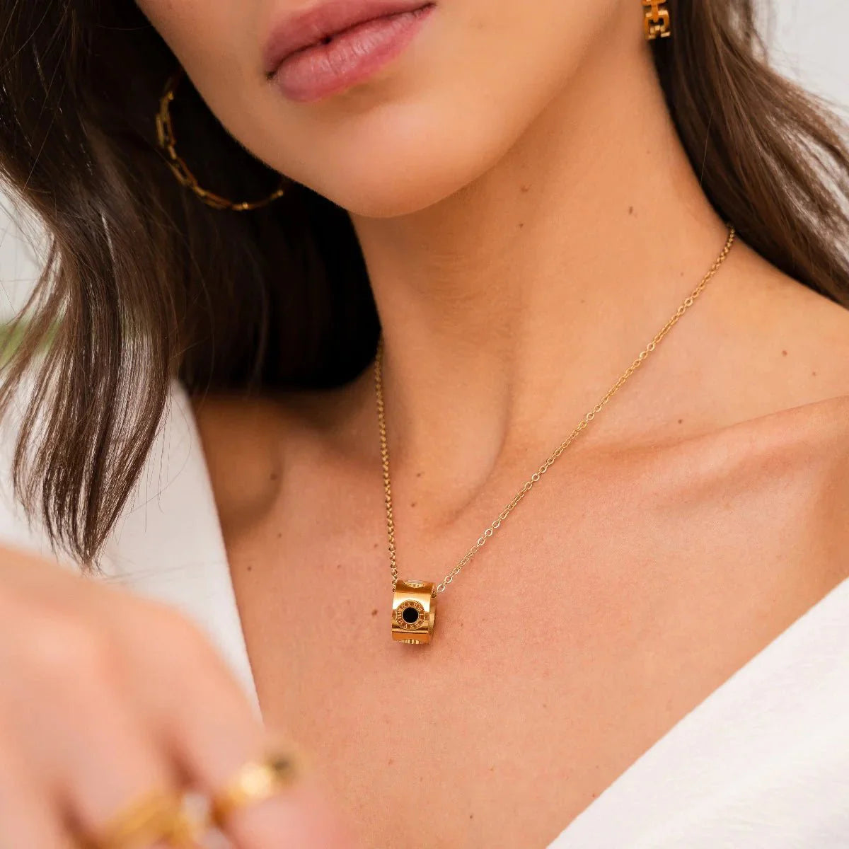 Rotating Roman Numeral Necklace Plated in 18K Gold